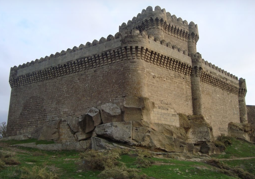 Raman Fortress structure with distant mountain views