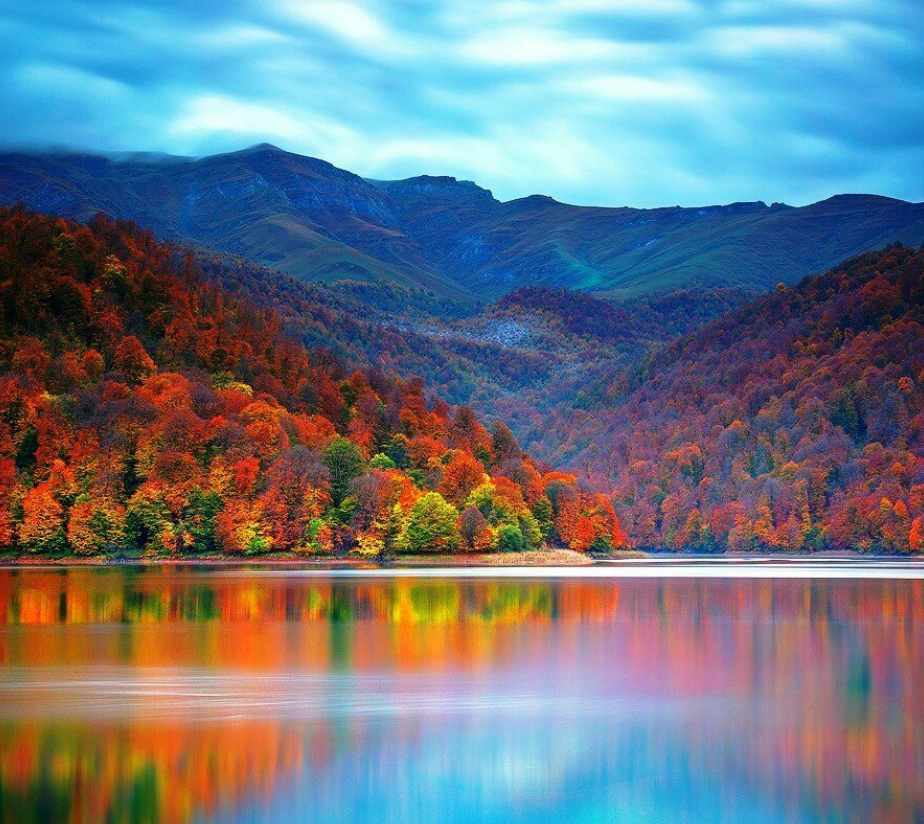 Tranquil waters of Horugel Lake reflecting the sky