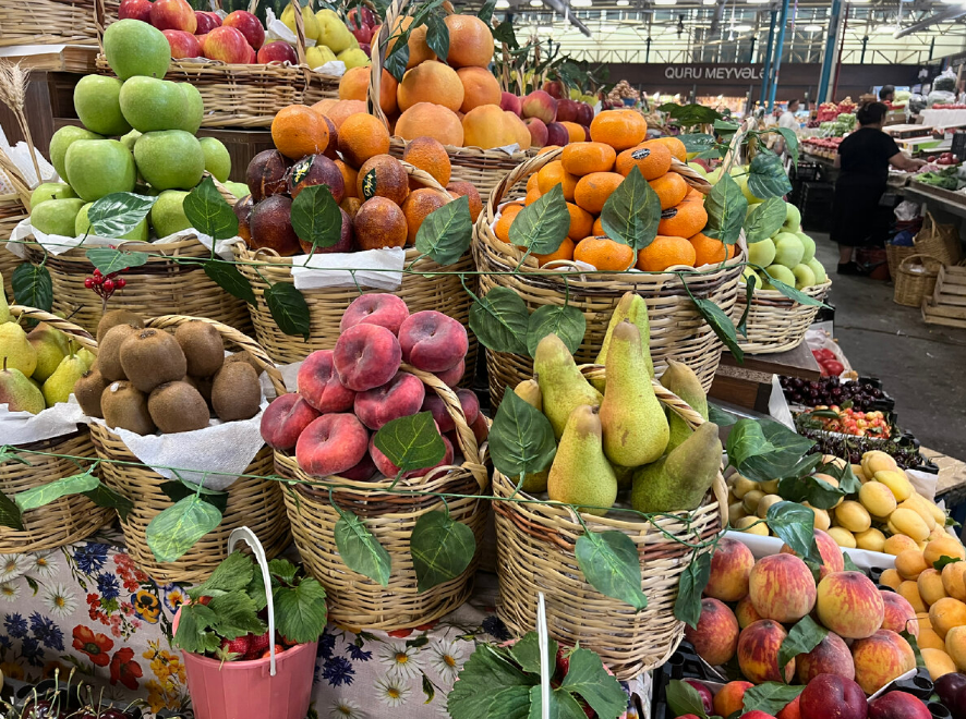 Vibrant spices and herbs displayed at Yashil-Bazar